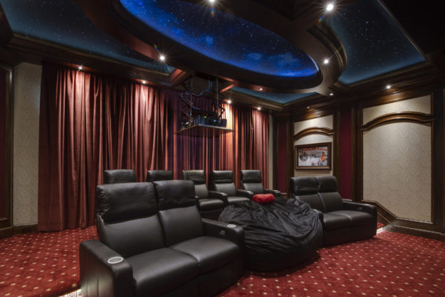 Motorized ceiling-mounted projector